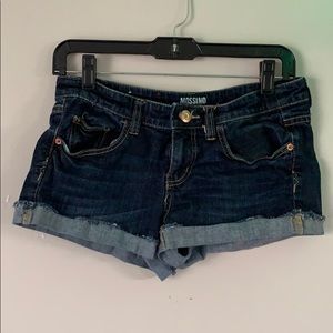 Dark washed, cuffed,  cut-off jean shorts
